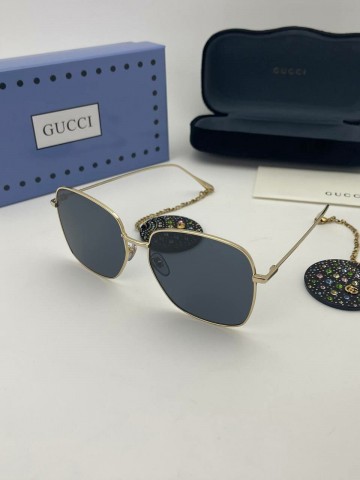 Солнцезащитные очки Gucci