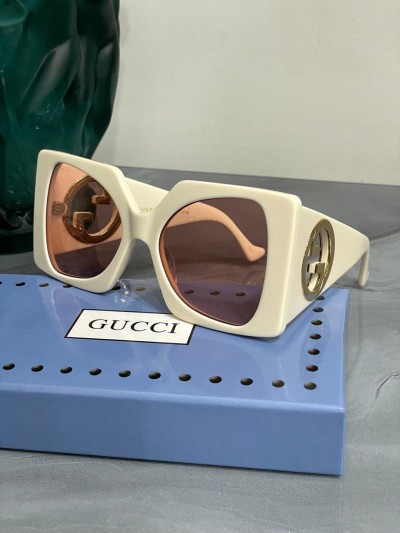 Солнцезащитные очки Gucci