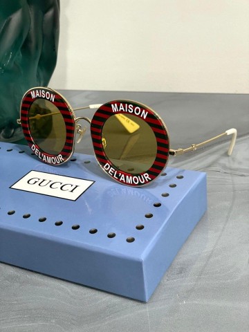 Солнцезащитные очки Gucci