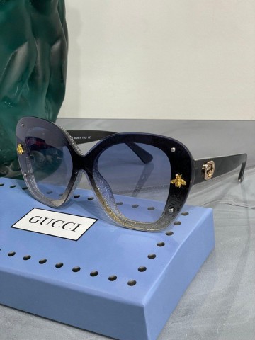 Солнцезащитные очки Gucci