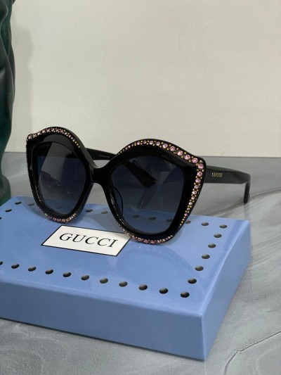 Солнцезащитные очки Gucci