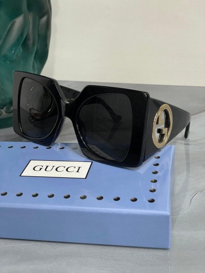 Солнцезащитные очки Gucci