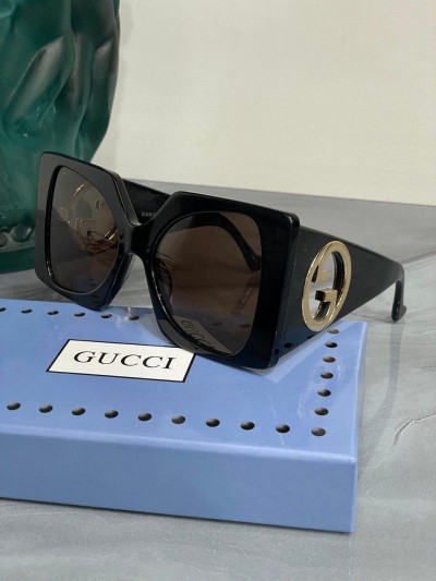 Солнцезащитные очки Gucci