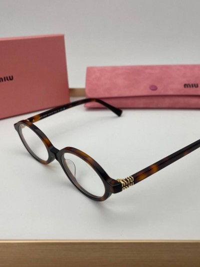 Солнцезащитные очки MIU MIU