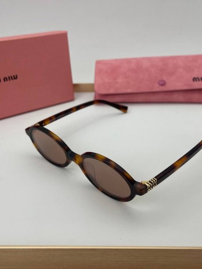 Солнцезащитные очки MIU MIU