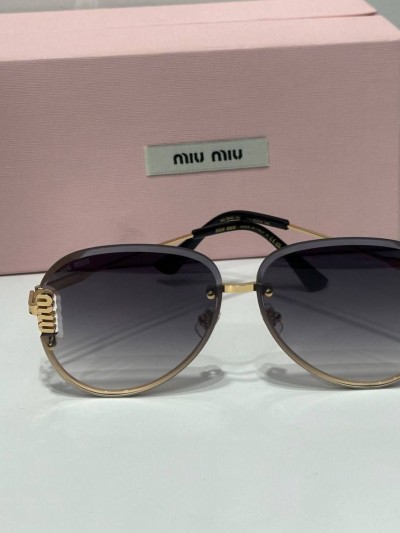 Солнцезащитные очки MIU MIU