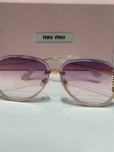 Солнцезащитные очки MIU MIU