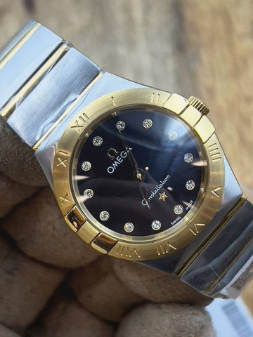 Часы Omega