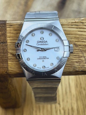 Часы Omega