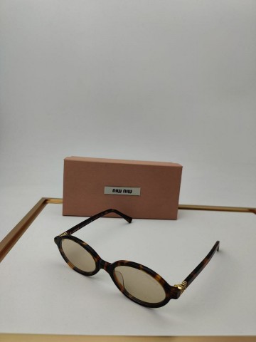 Солнцезащитные очки MIU MIU