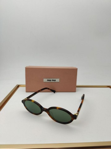 Солнцезащитные очки MIU MIU