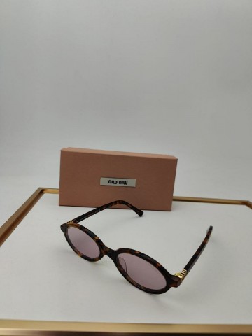 Солнцезащитные очки MIU MIU