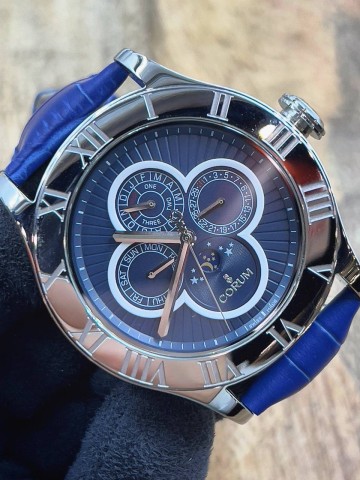 Часы Corum