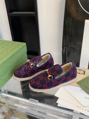 Лоферы Gucci с мехом
