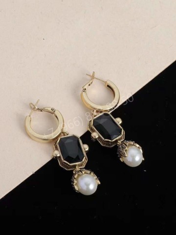Серьги Alexander McQueen