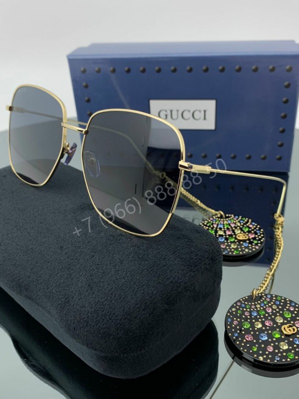 Солнцезащитные очки Gucci