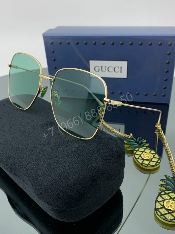 Солнцезащитные очки Gucci