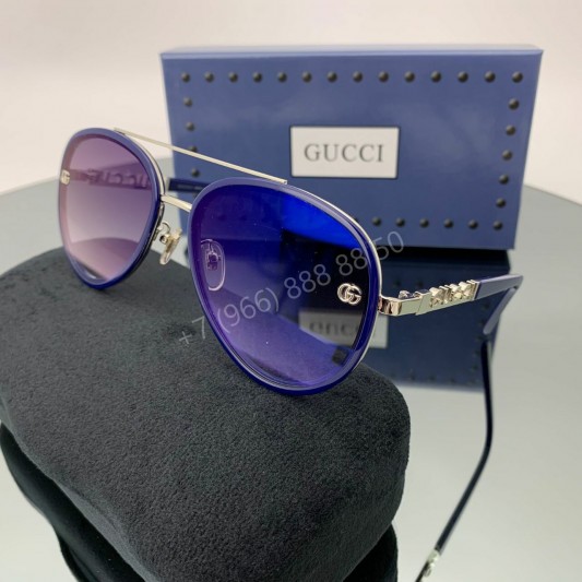 Солнцезащитные очки Gucci