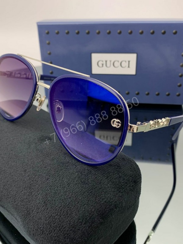 Солнцезащитные очки Gucci