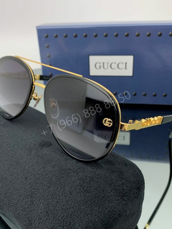 Солнцезащитные очки Gucci