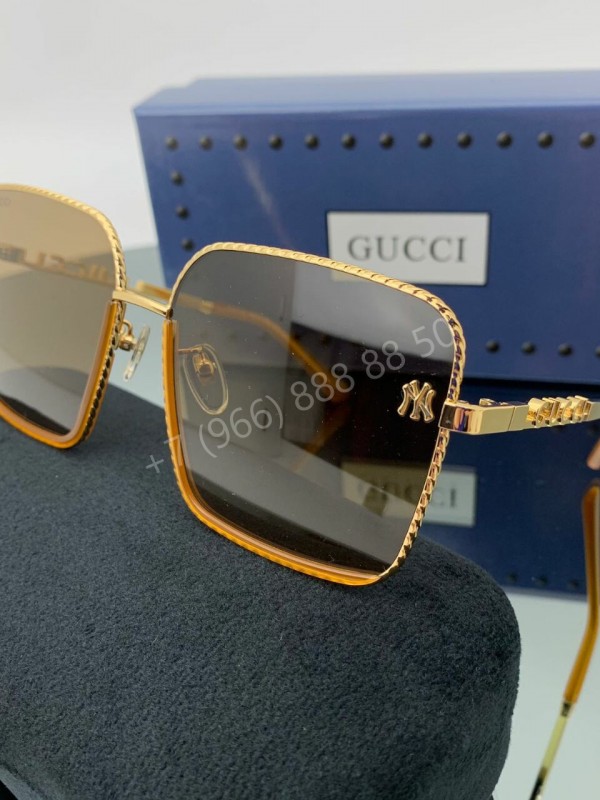 Солнцезащитные очки Gucci