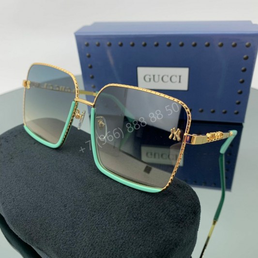 Солнцезащитные очки Gucci