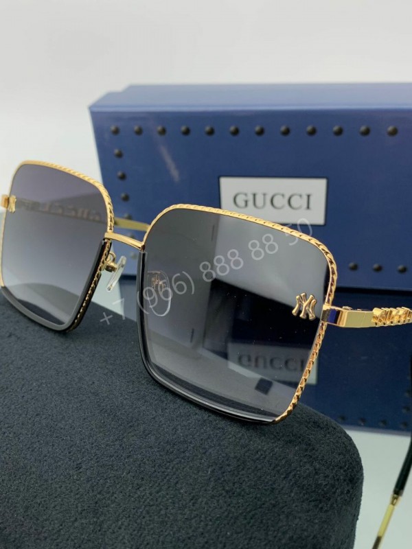 Солнцезащитные очки Gucci