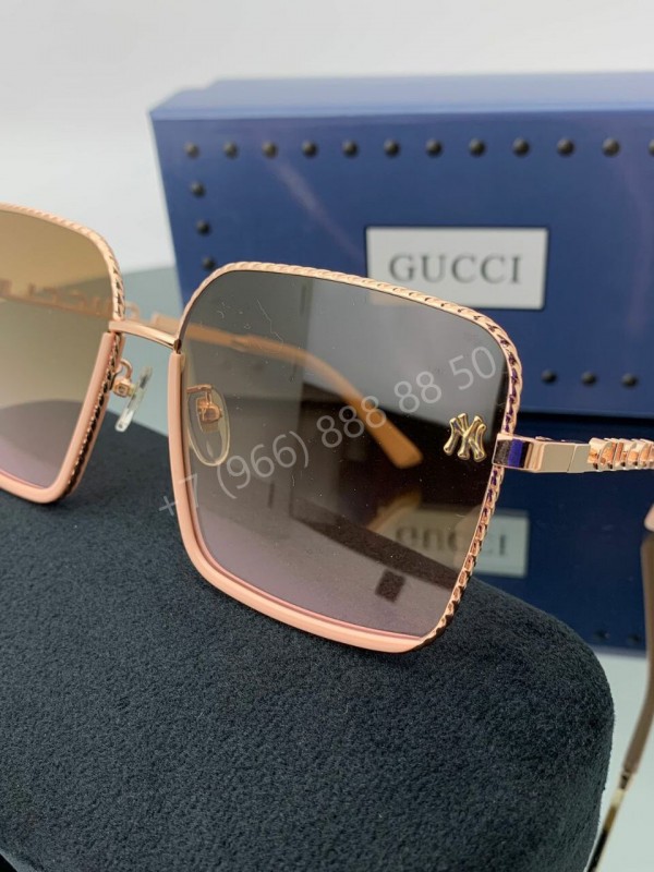 Солнцезащитные очки Gucci